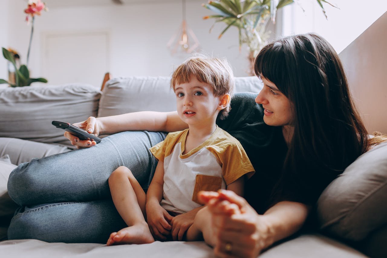 Mother and Son Watching TV Together